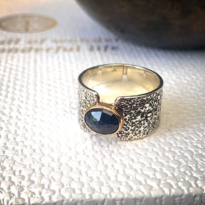 Solid sterling silver and gold ring set with deep blue, rose cut Sapphire. Size R1/2